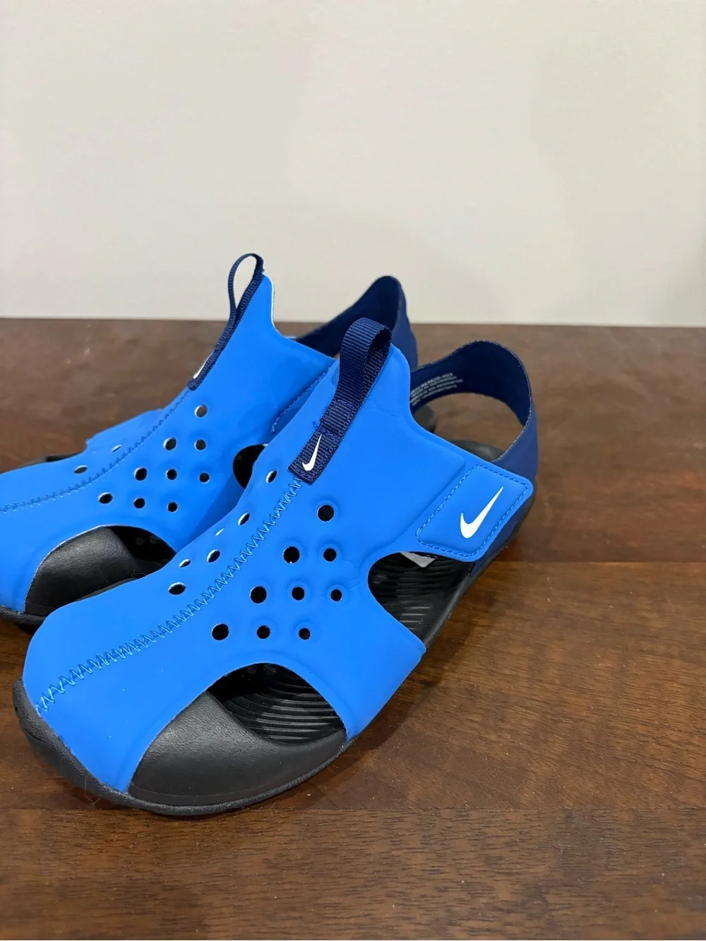 Nike Kids Blue Closed-Toe Sport Sandals with Navy Accents
